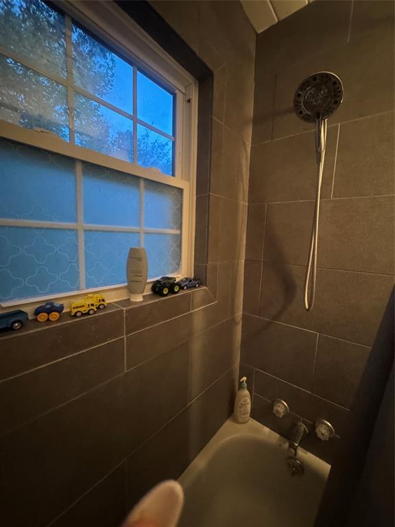 708 West 1st Street Hico, TX 76457 - Photo 9 of 24 a bathroom with a shower