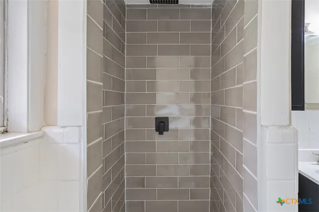 a view of a workspace with furniture