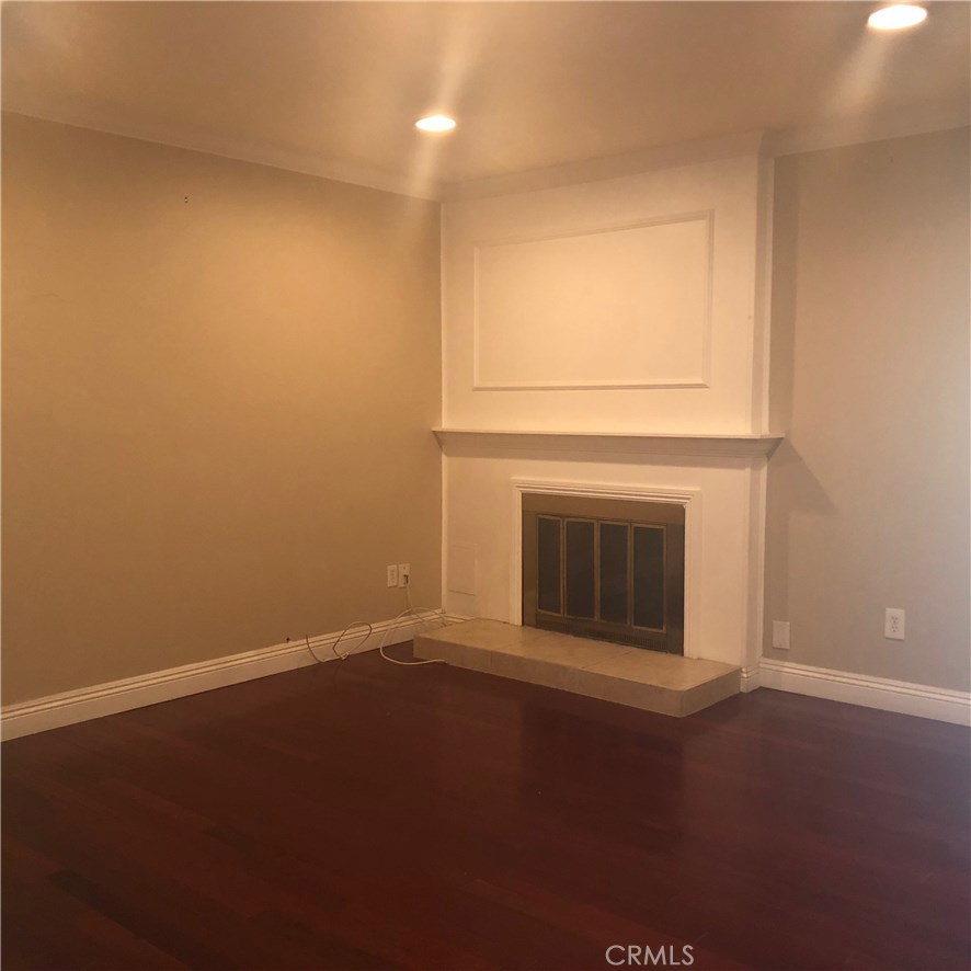 9150 Malachite Avenue Rancho Cucamonga, CA 91730 - Photo 9 of 9 a view of empty room with a fireplace
