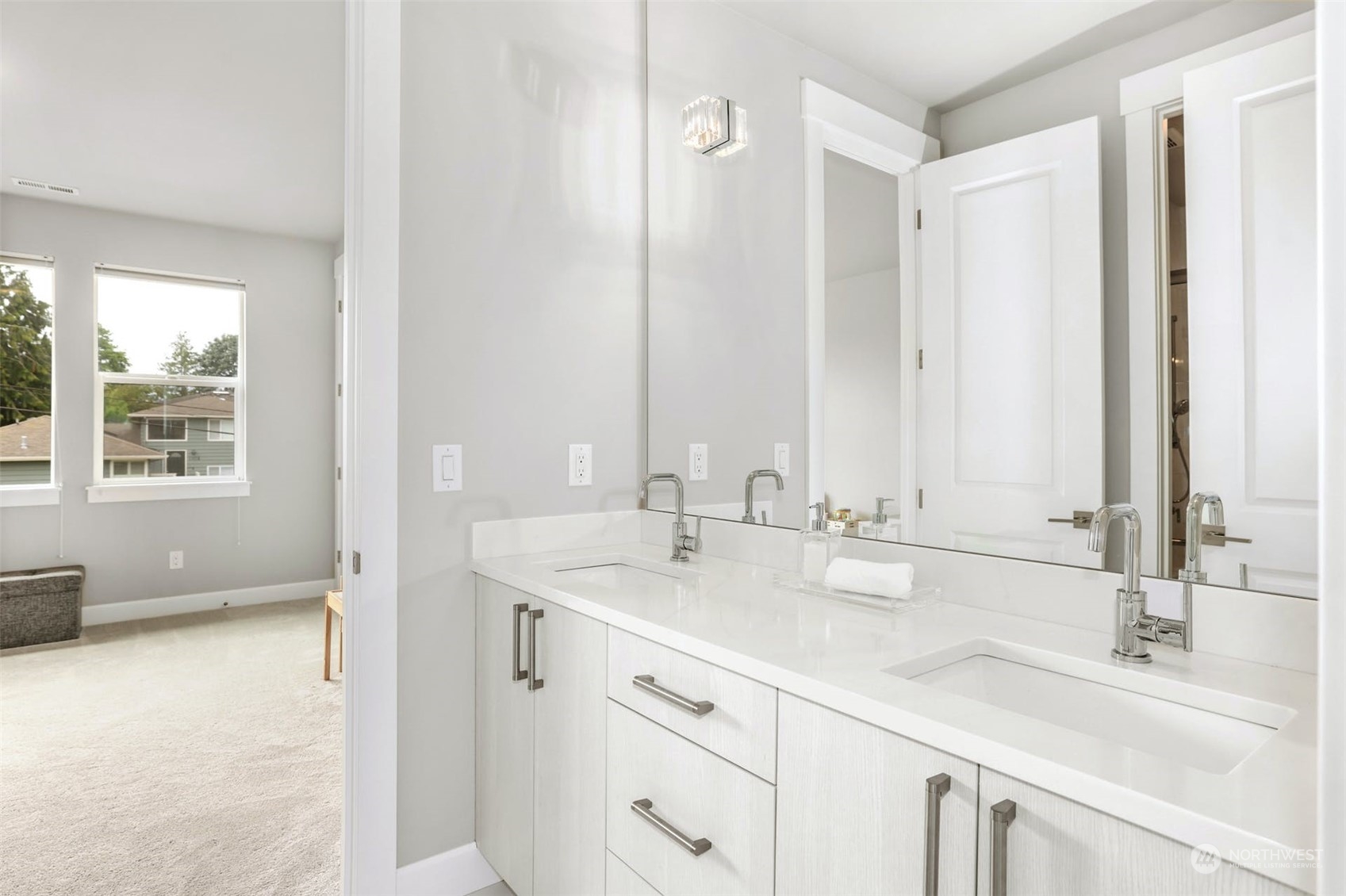 1104 North 34th Street Renton, WA 98056 - Photo 22 of 40 a bathroom with double sink and a mirror
