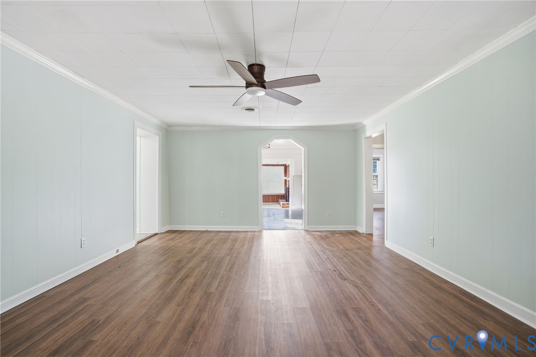 9102 Boydton Plank Road Petersburg, VA 23803 - Photo 9 of 32 wooden floor in an empty room with a window