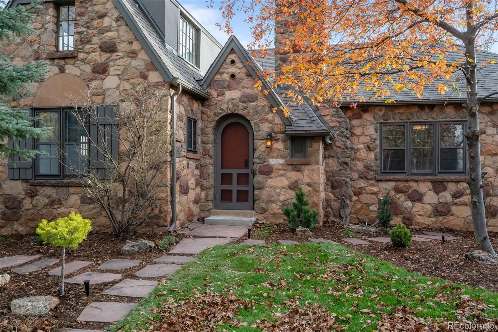 772 16th Street Boulder, CO 80302 - Photo 3 of 26 a front view of a house with garden