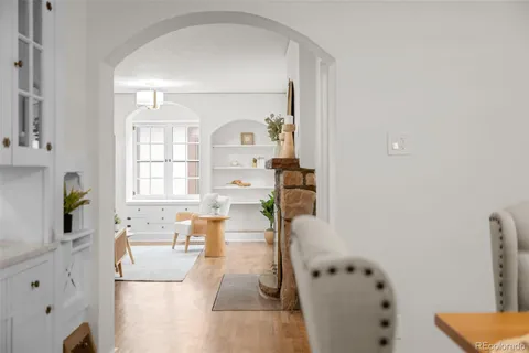 a bathroom with a bathtub sink and mirror