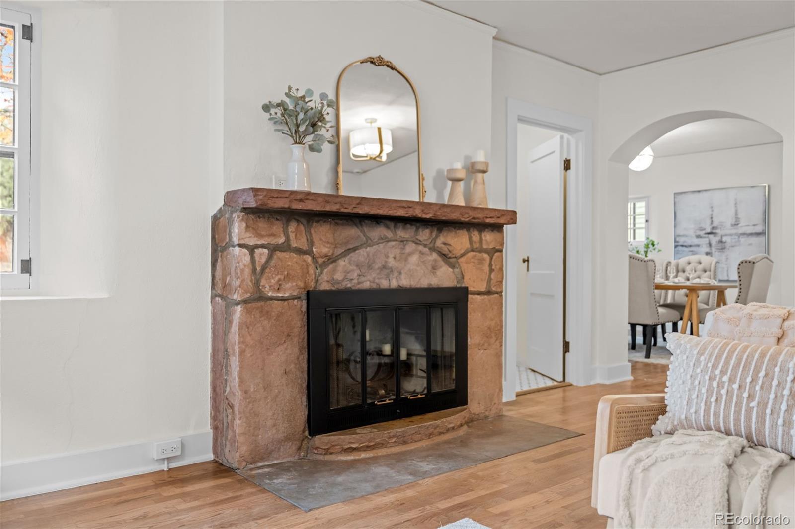 772 16th Street Boulder, CO 80302 - Photo 7 of 26 a living room with furniture and a fireplace