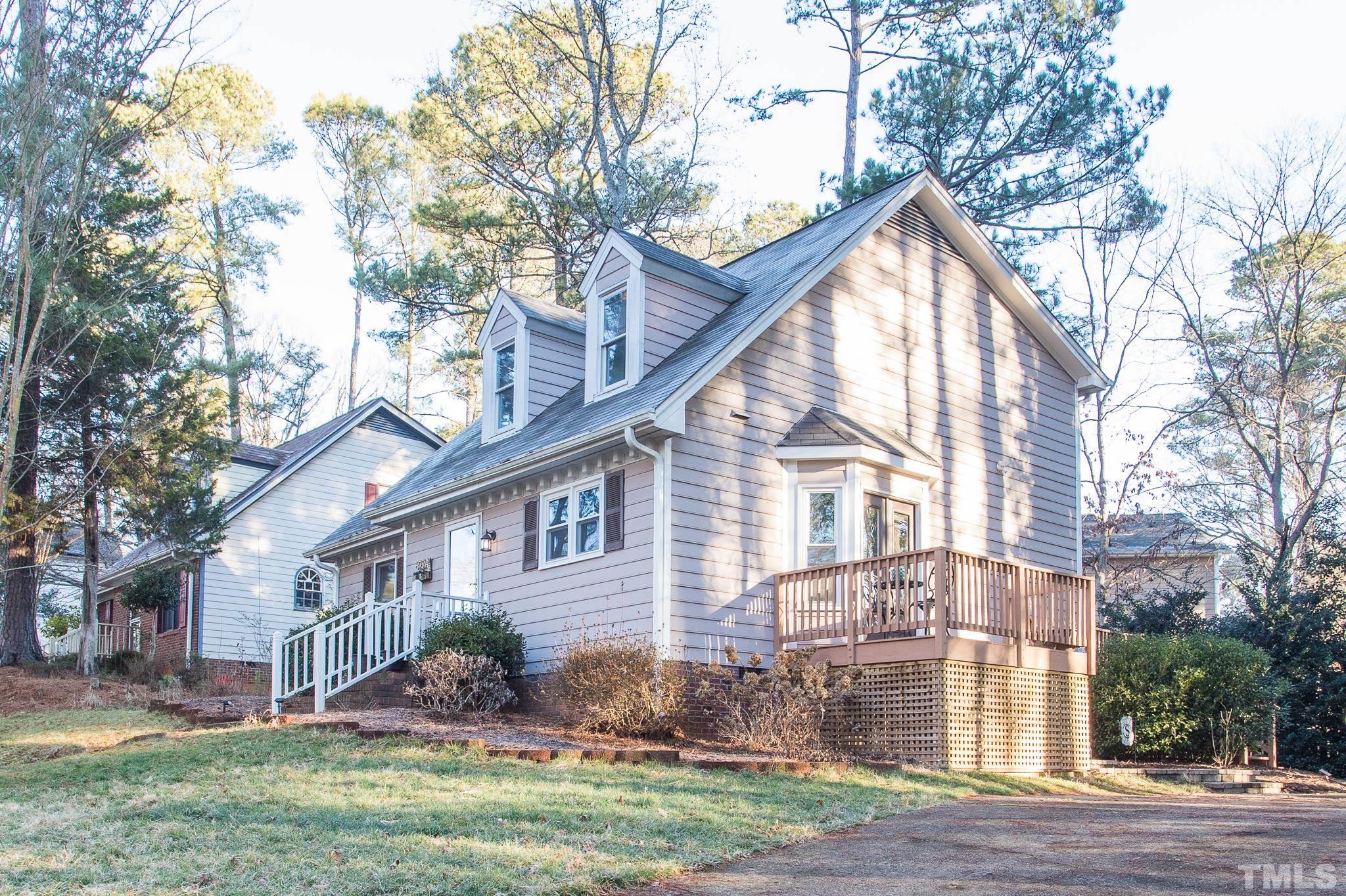 6924 Glendower Road Raleigh, NC 27613 - Photo 27 of 27 a view of a house with a yard