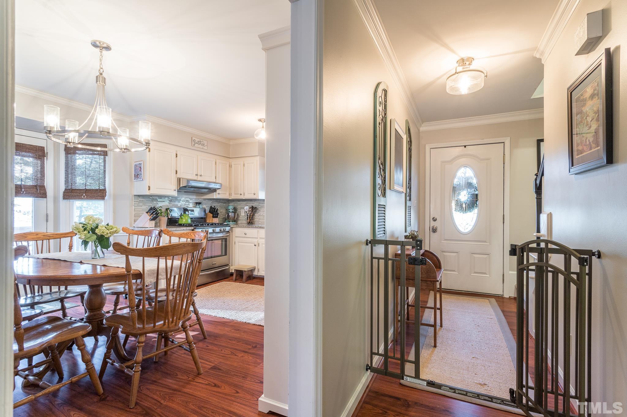6924 Glendower Road Raleigh, NC 27613 - Photo 3 of 27 a view of a kitchen and dining room