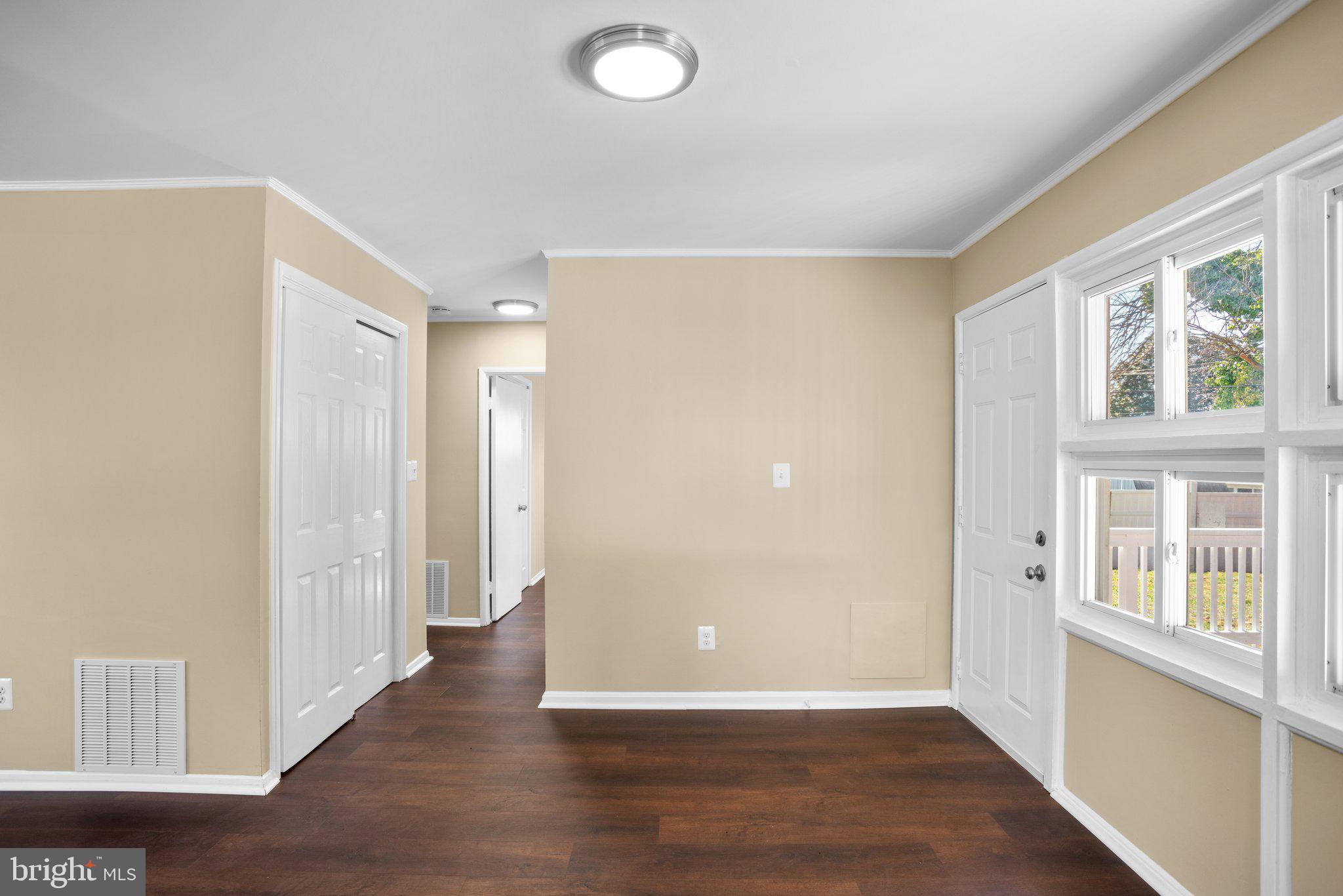 1030 Collwood Road Catonsville, MD 21228 - Photo 12 of 48 a view of a big room with wooden floor and windows