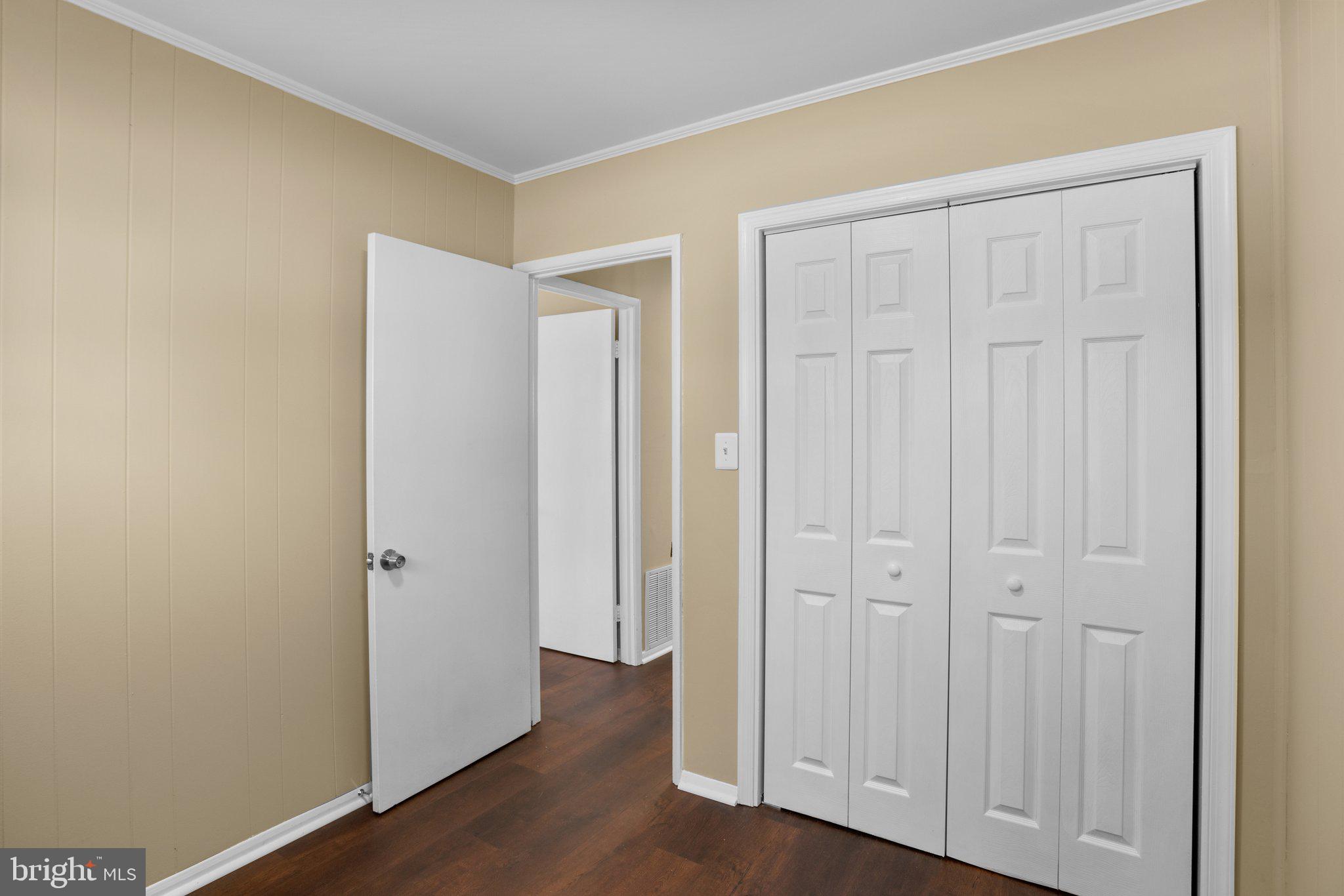 1030 Collwood Road Catonsville, MD 21228 - Photo 27 of 48 an empty room with wooden floor