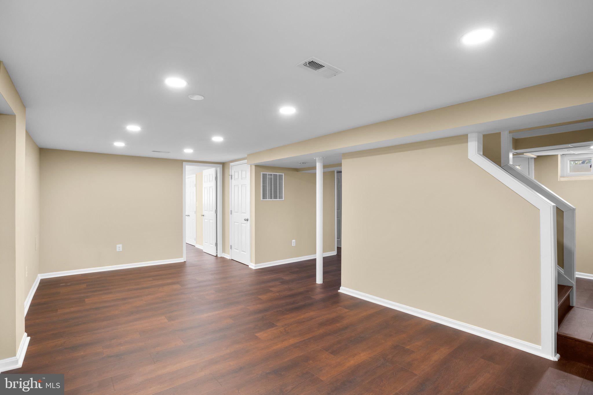 1030 Collwood Road Catonsville, MD 21228 - Photo 28 of 48 a view of an empty room with wooden floor