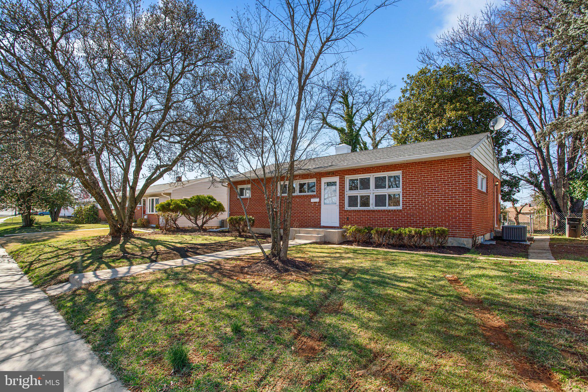 1030 Collwood Road Catonsville, MD 21228 - Photo 3 of 48 a view of a yard with a house
