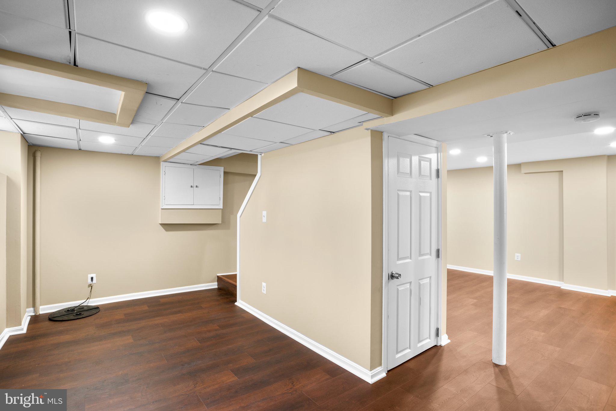 1030 Collwood Road Catonsville, MD 21228 - Photo 33 of 48 a view of a hallway with wooden floor