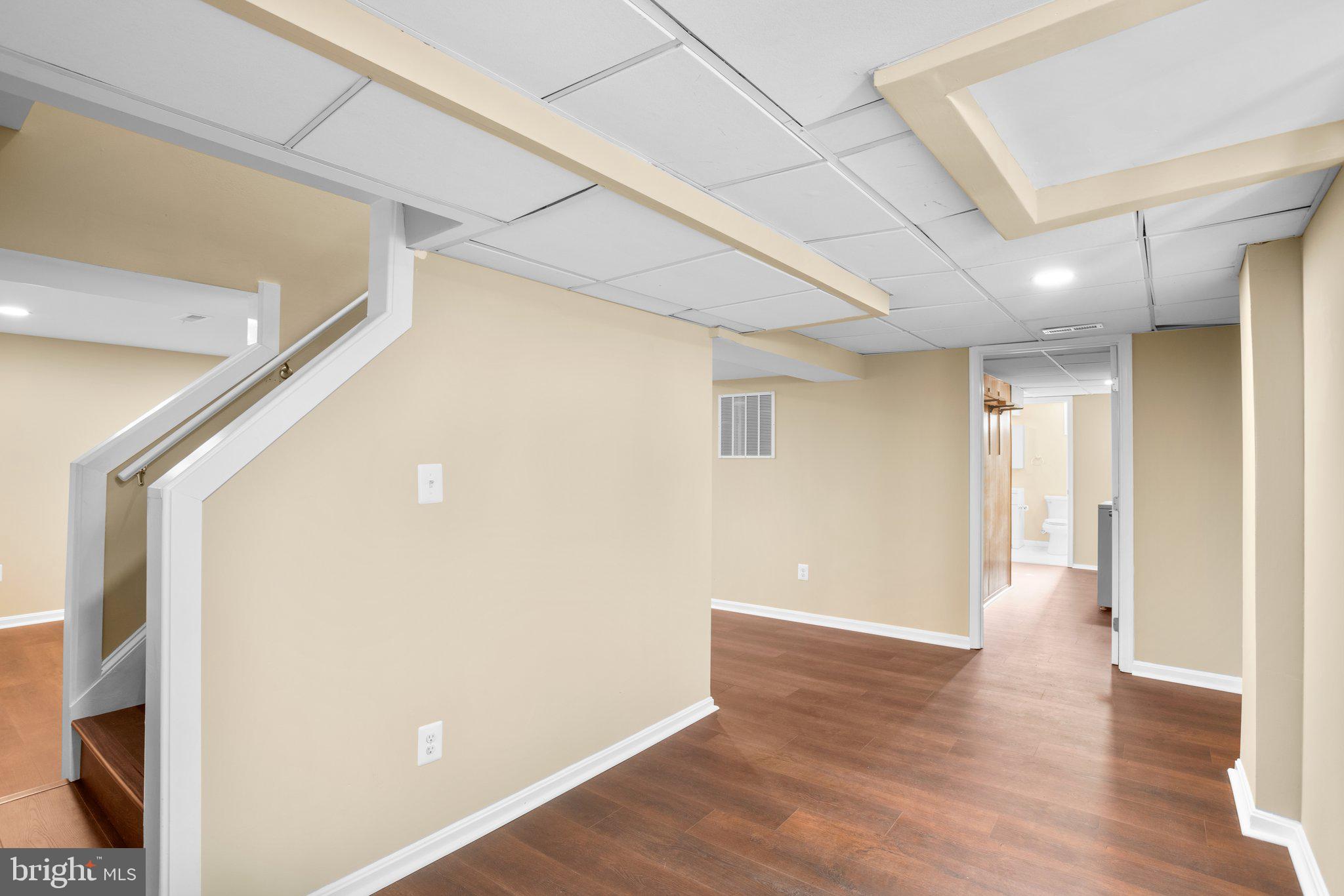 1030 Collwood Road Catonsville, MD 21228 - Photo 34 of 48 a view of a hallway with wooden floor