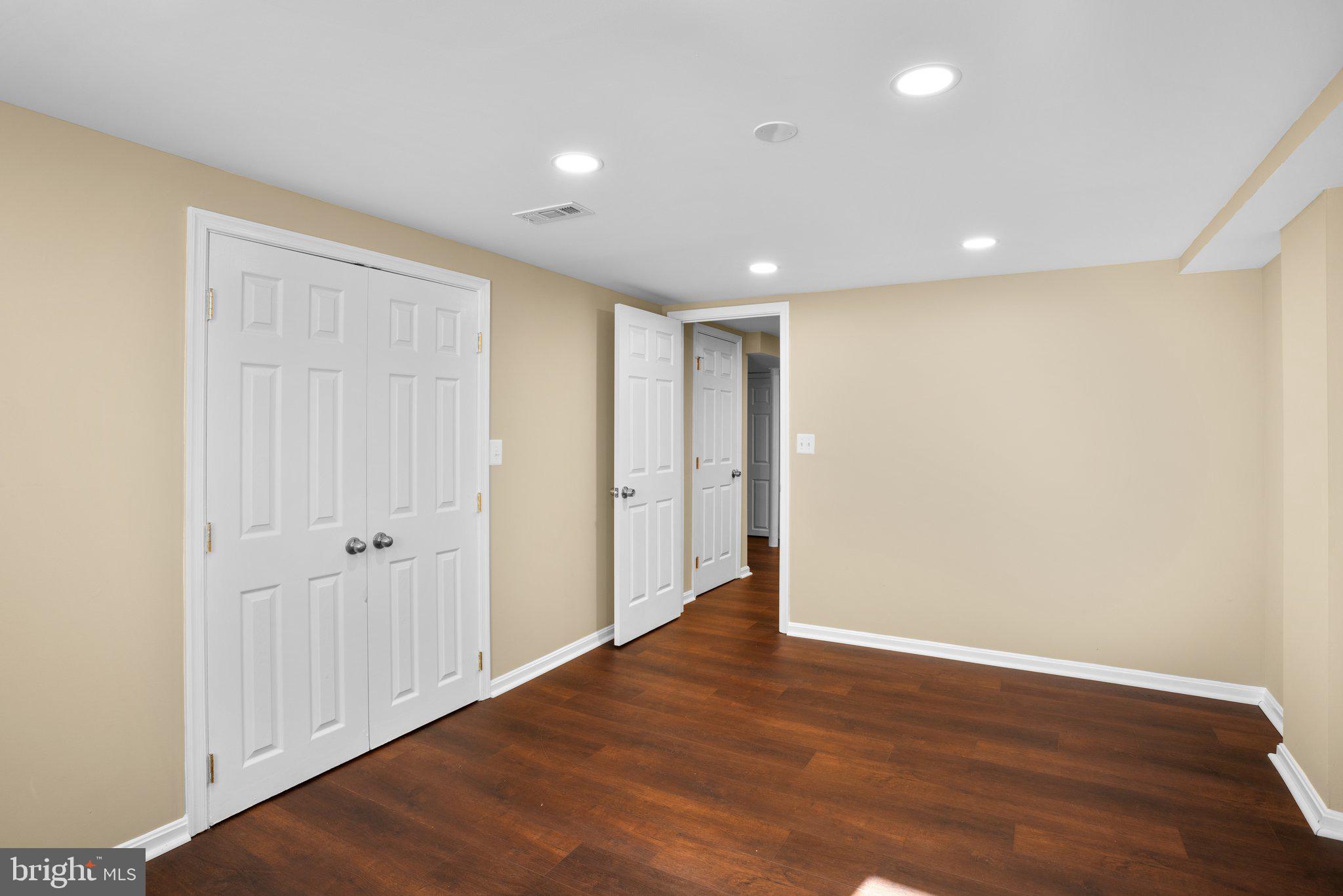 1030 Collwood Road Catonsville, MD 21228 - Photo 38 of 48 a view of an empty room with wooden floor