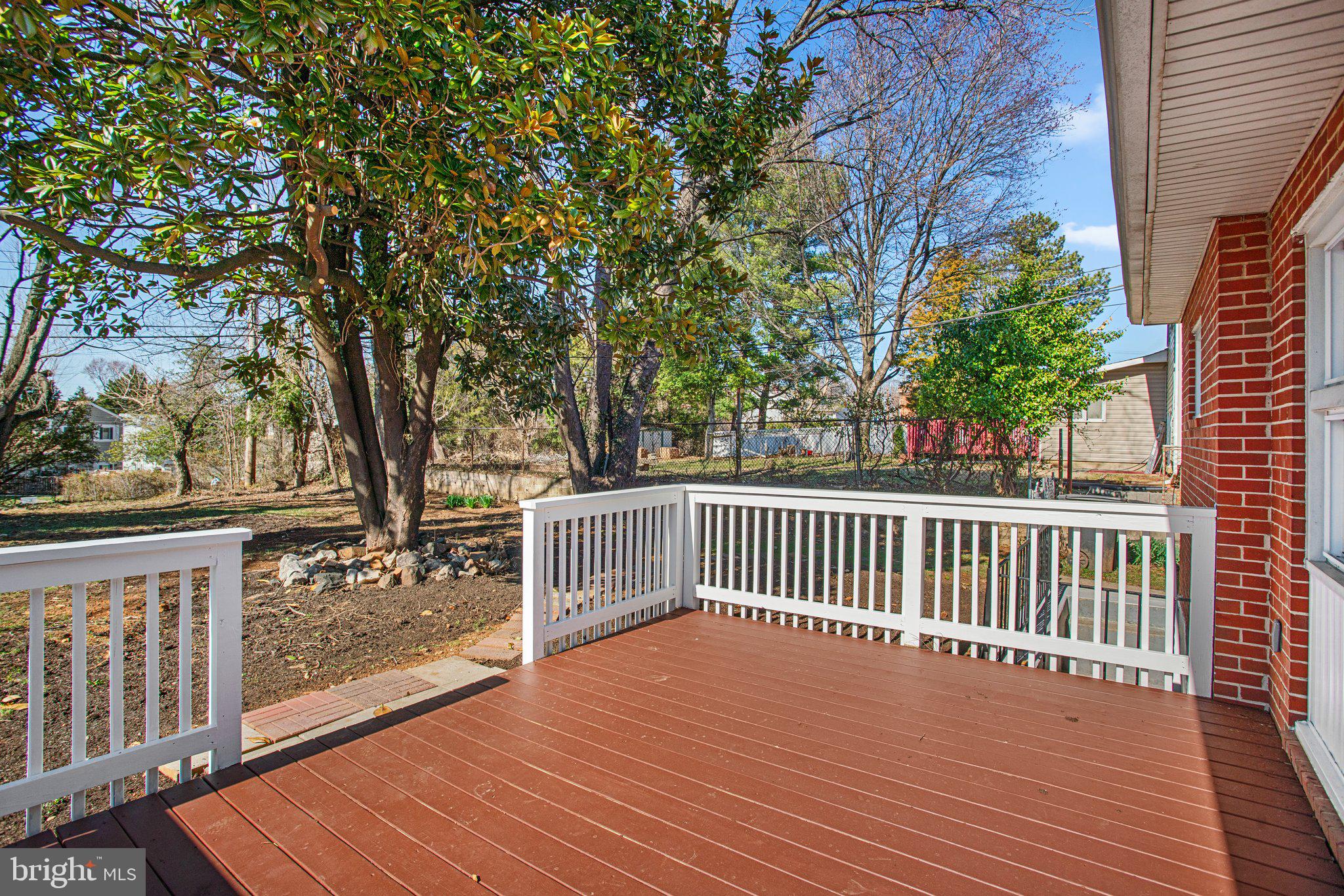 1030 Collwood Road Catonsville, MD 21228 - Photo 42 of 48 a view of deck with wooden floor and outdoor seating