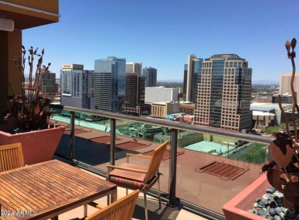 310 South 4th Street, Unit 1602 Phoenix, AZ 85004 - Photo 14 of 20 a view of a city with tall buildings