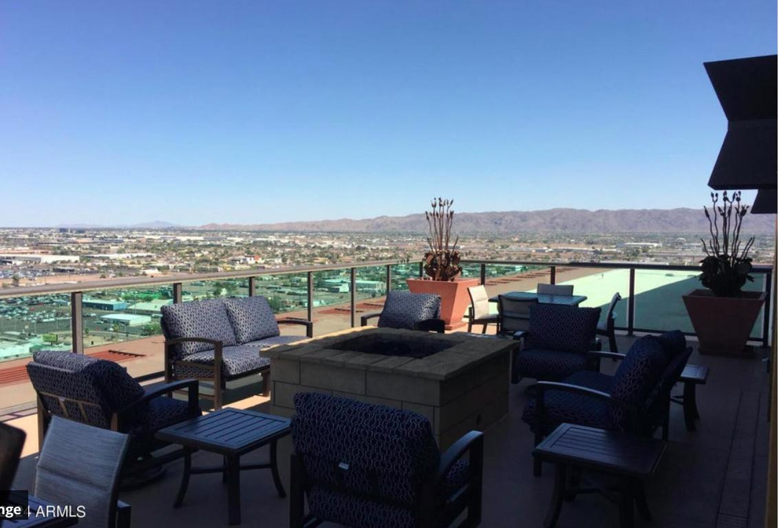 310 South 4th Street, Unit 1602 Phoenix, AZ 85004 - Photo 15 of 20 a view of a terrace with furniture