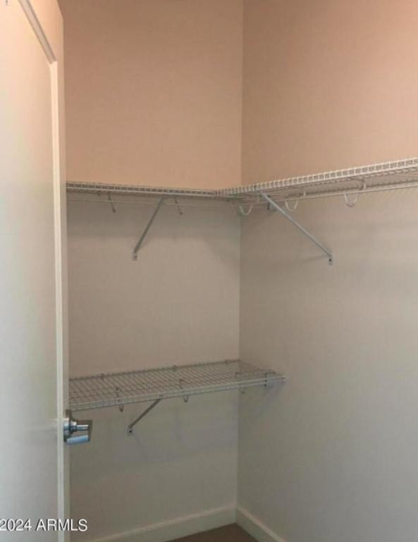 310 South 4th Street, Unit 1602 Phoenix, AZ 85004 - Photo 7 of 20 a view of a room with racks on the wall