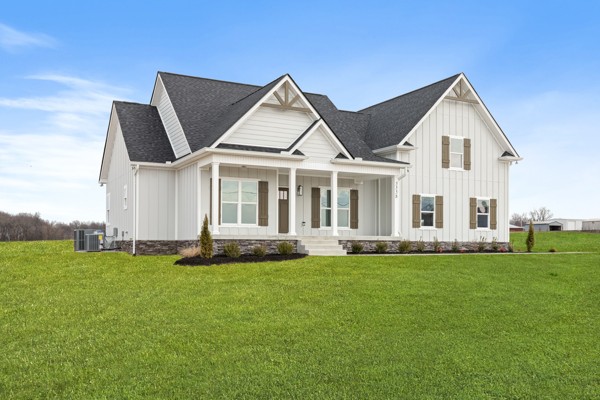 5558 Borthick Road Springfield, TN 37172 - Photo 3 of 43 a front view of a house with a garden