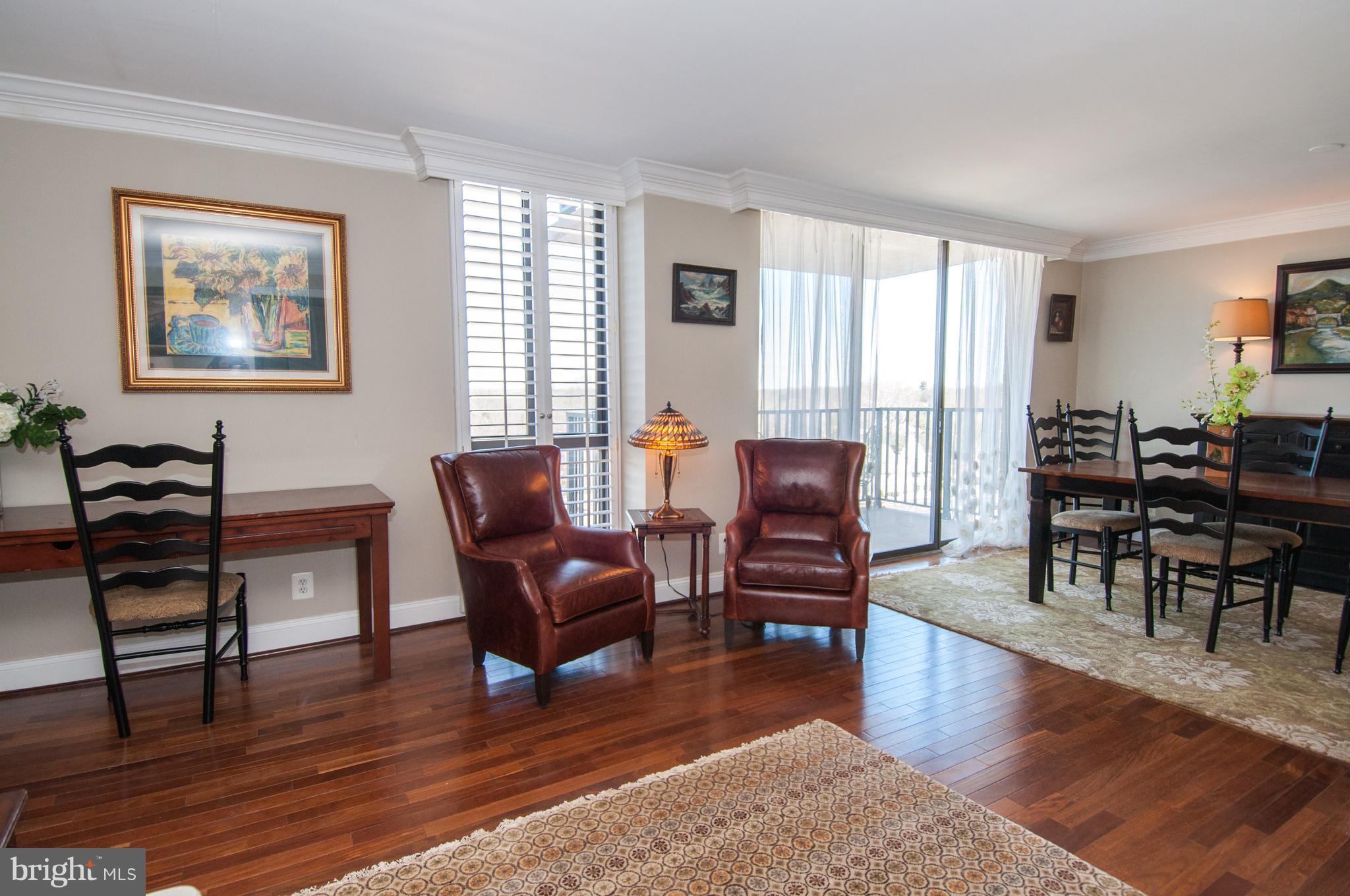 6800 Fleetwood Road, Unit 1017 McLean, VA 22101 - Photo 12 of 24 a living room with furniture and a wooden floor