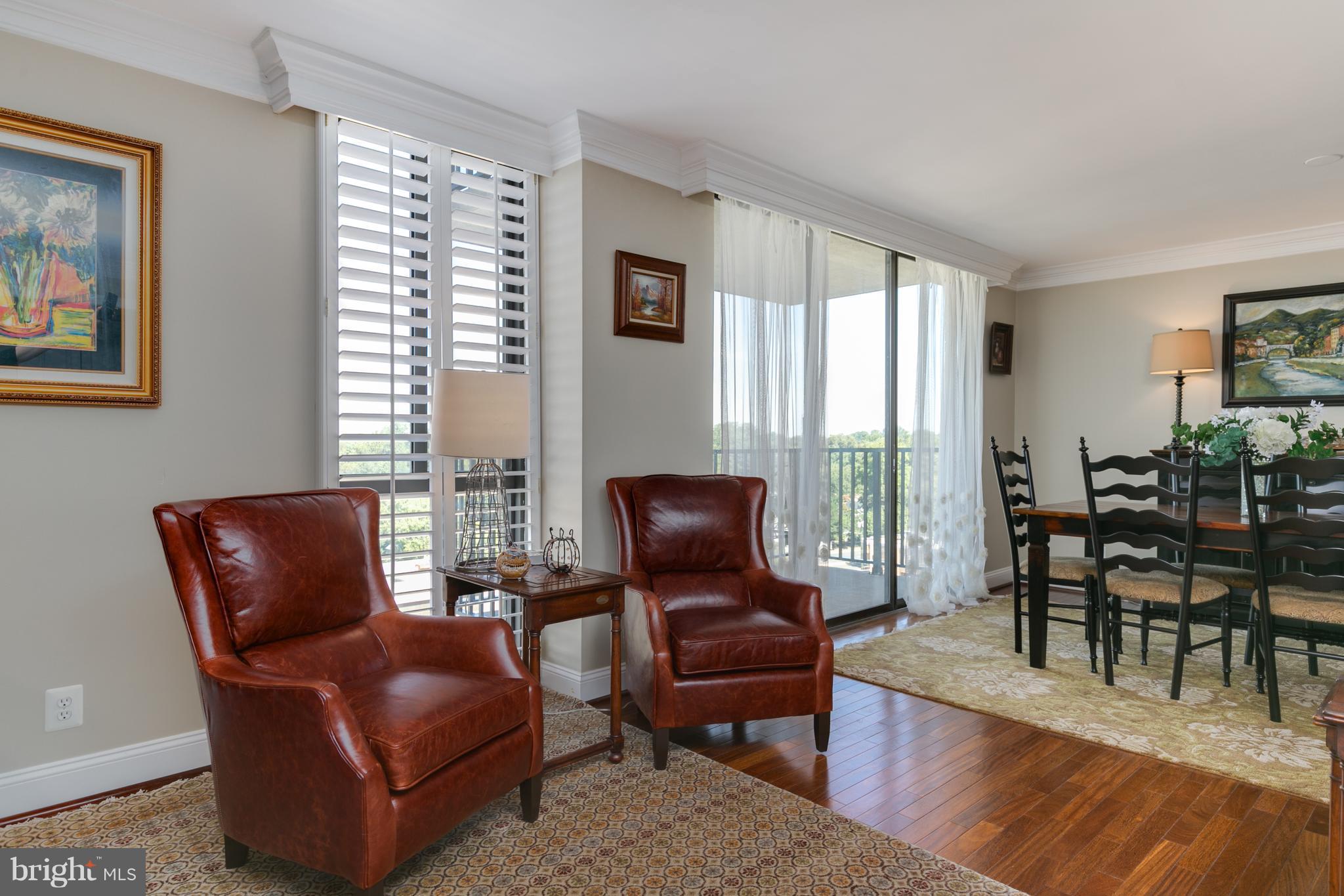 6800 Fleetwood Road, Unit 1017 McLean, VA 22101 - Photo 13 of 24 a living room with furniture and a fireplace