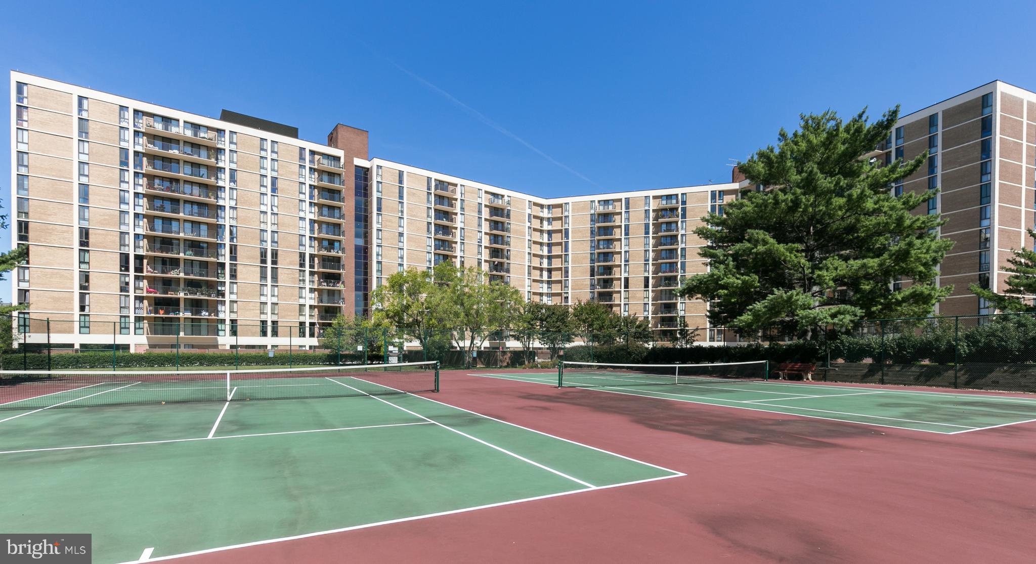 6800 Fleetwood Road, Unit 1017 McLean, VA 22101 - Photo 22 of 24 a view of a building with a yard