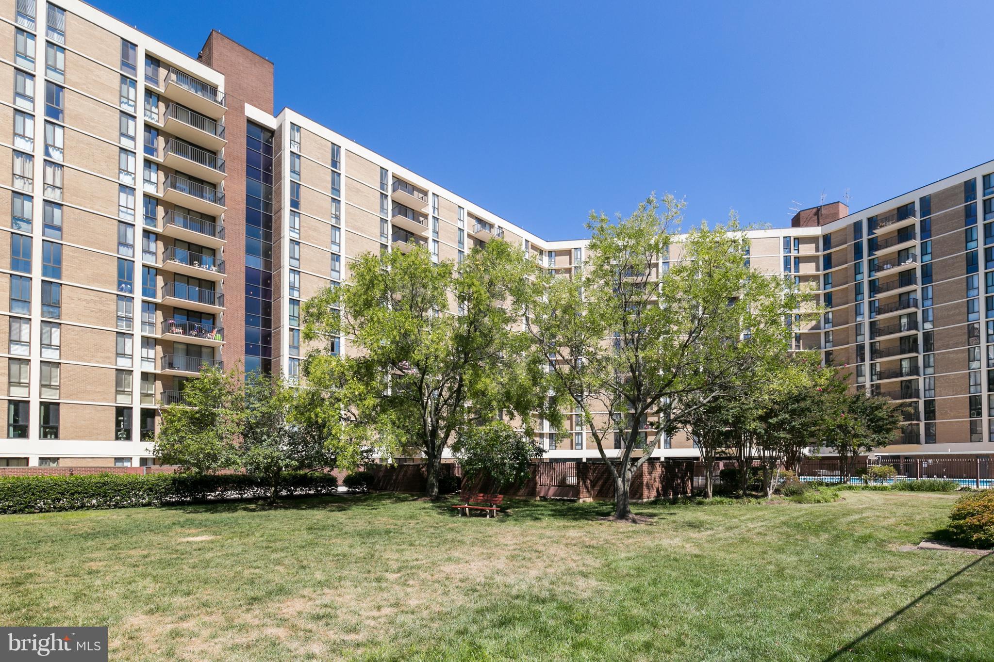 6800 Fleetwood Road, Unit 1017 McLean, VA 22101 - Photo 23 of 24 a view of a building with a yard