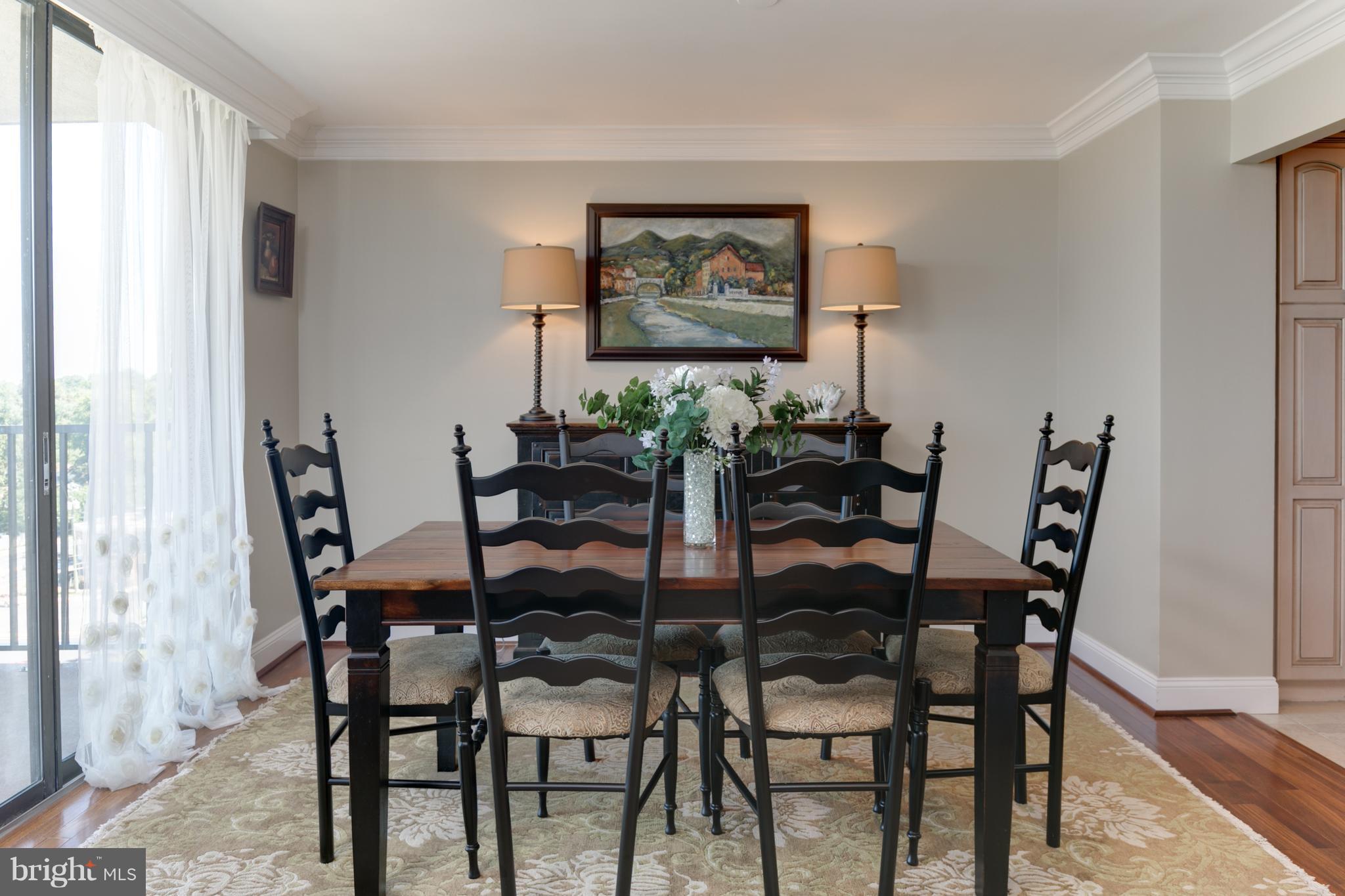 6800 Fleetwood Road, Unit 1017 McLean, VA 22101 - Photo 6 of 24 a dining room with furniture and window