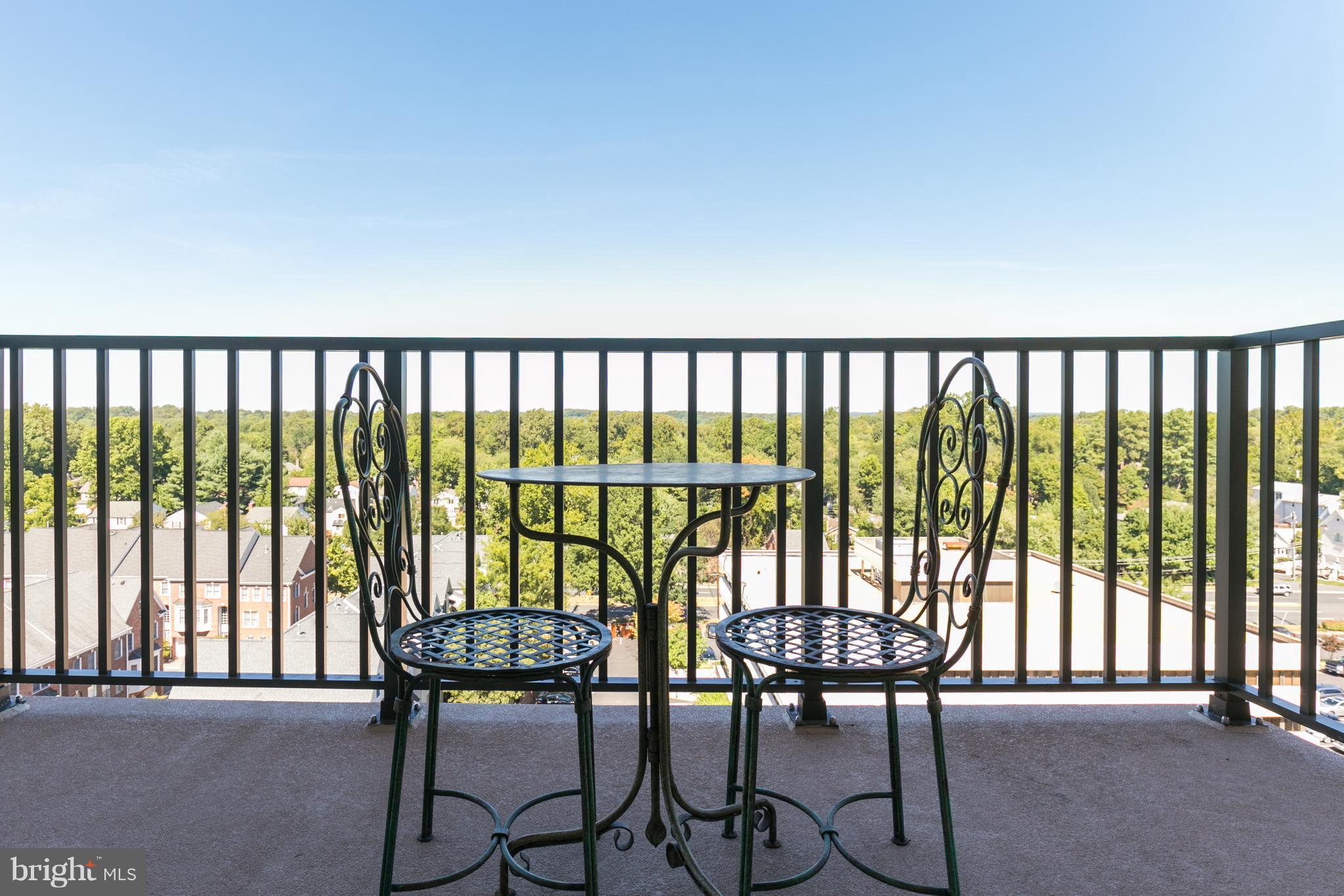 6800 Fleetwood Road, Unit 1017 McLean, VA 22101 - Photo 8 of 24 a view of a chairs and table in the balcony
