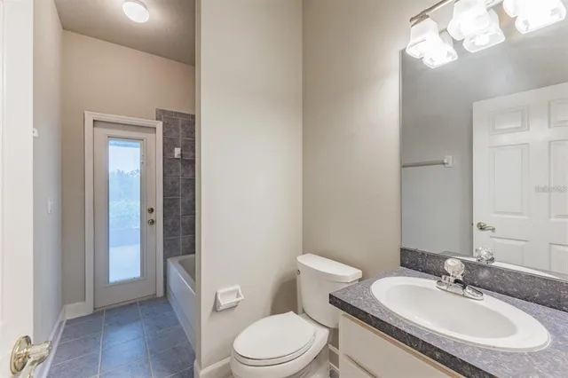 a view of an empty room with glass windows