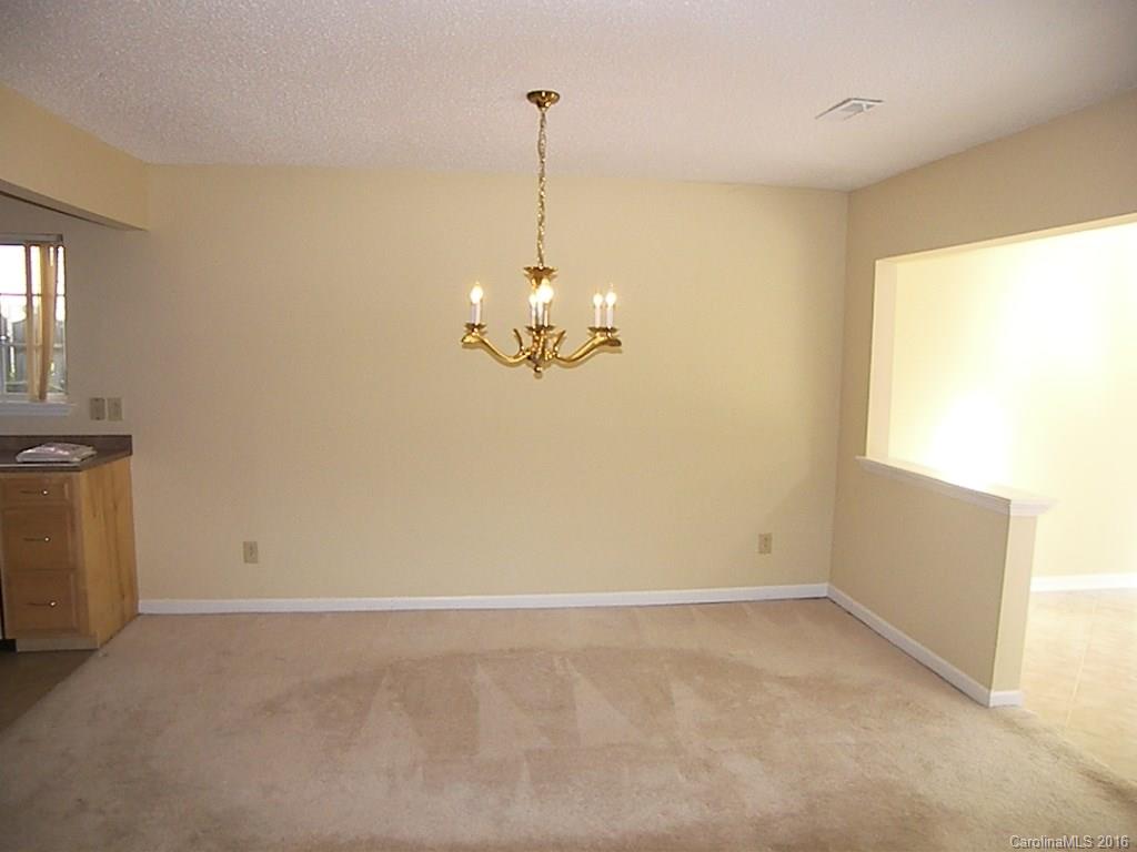 9913 Fairway Ridge Road Charlotte, NC 28277 - Photo 7 of 18 a view of a decorative light in a room