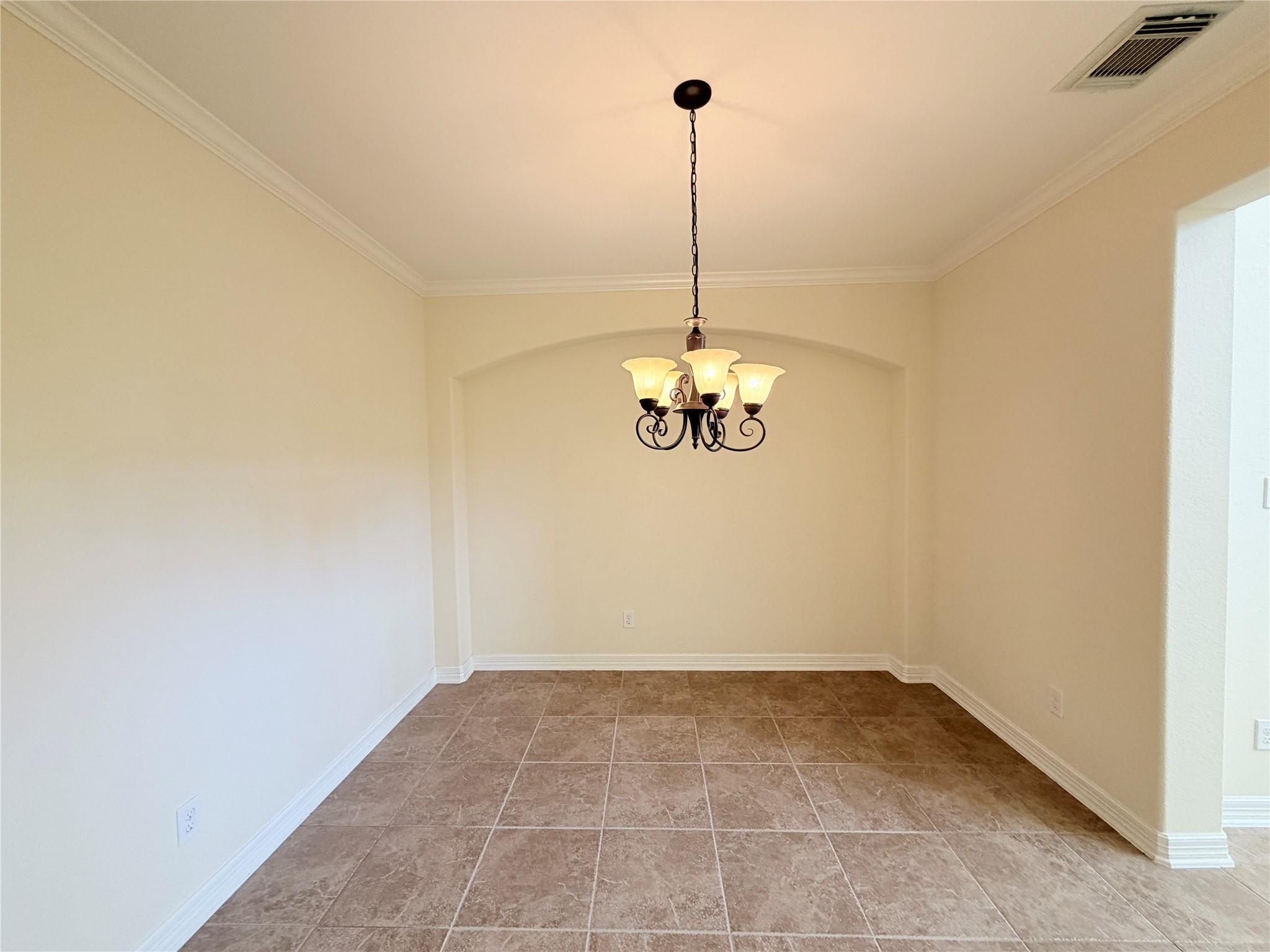 28015 Silverstream Court Fulshear, TX 77441 - Photo 11 of 33 a view of a room with a chandelier fan and wooden floor