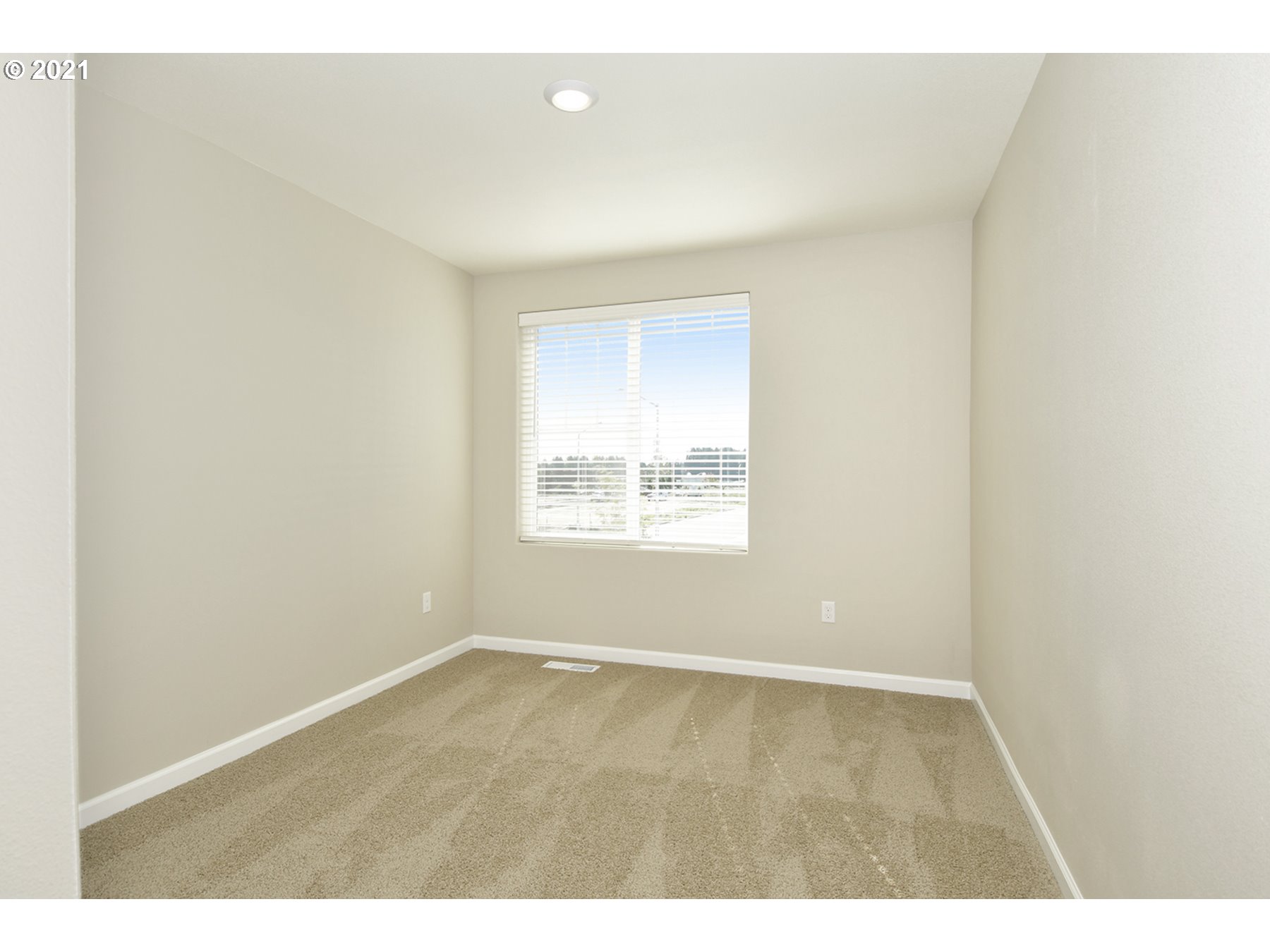 7011 Northeast 156th Place Vancouver, WA 98682 - Photo 13 of 21 an empty room with a window