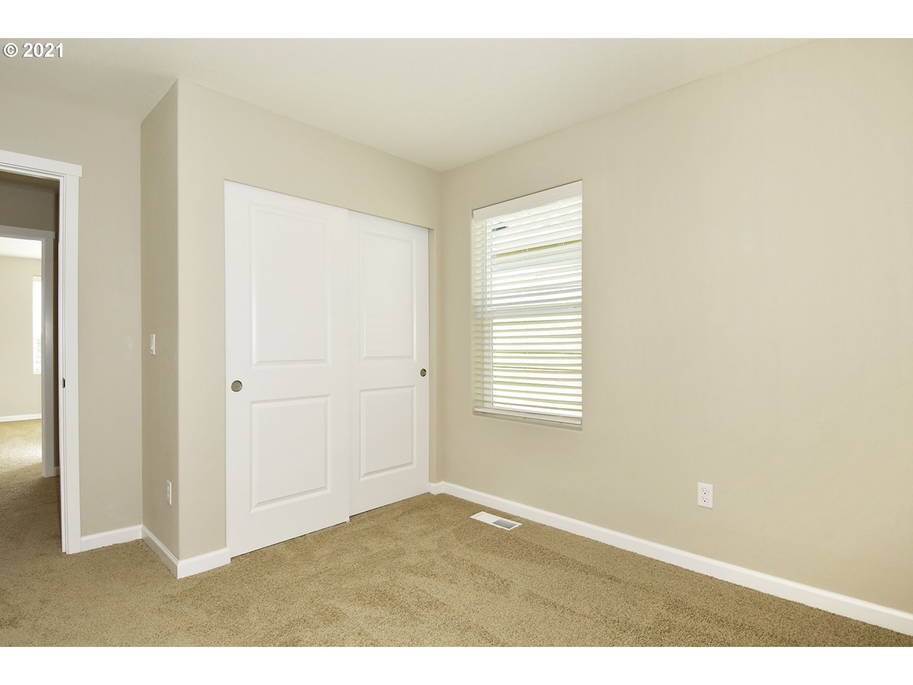 7011 Northeast 156th Place Vancouver, WA 98682 - Photo 16 of 21 a view of an empty room with a window