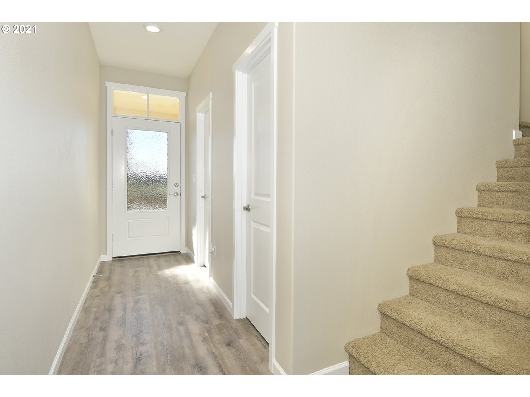 7011 Northeast 156th Place Vancouver, WA 98682 - Photo 7 of 21 a view of an entryway with wooden floor