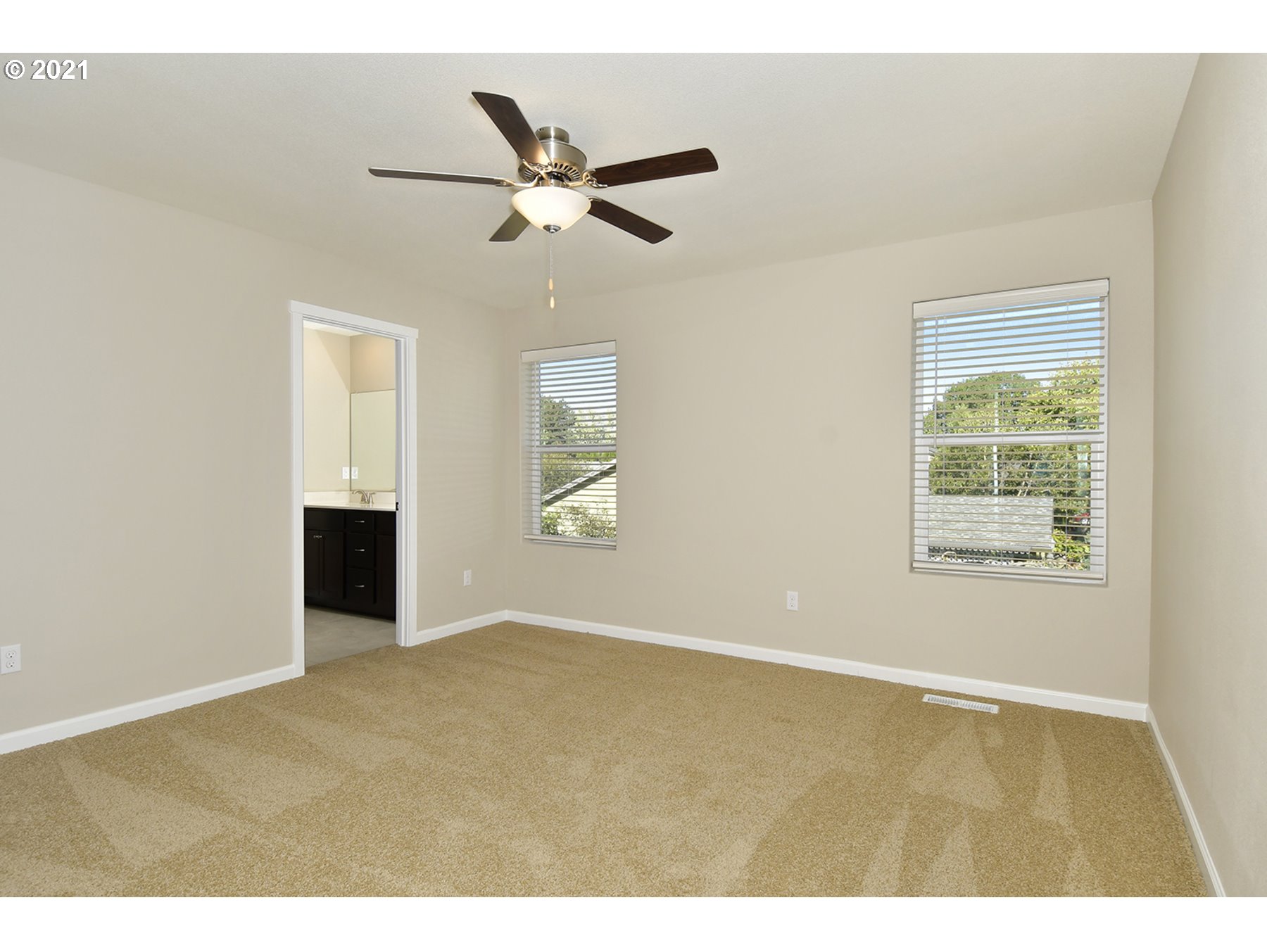 7011 Northeast 156th Place Vancouver, WA 98682 - Photo 10 of 21 a view of an empty room with a window