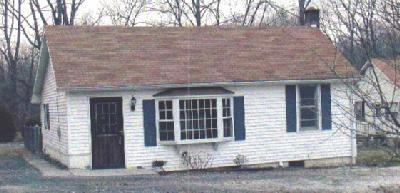 114 West Moorestown Road Wind Gap, PA 18091 - Photo 1 of 1 a front view of a house with large windows