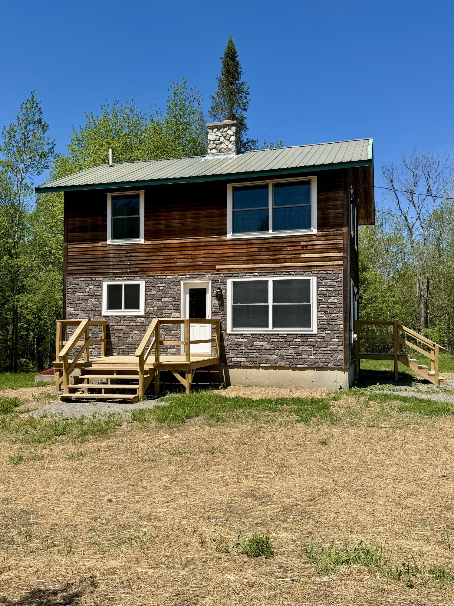 51 Big Boyd Lake Road Milo, ME 04463 - Photo 6 of 64 Stone Vinyl Facade