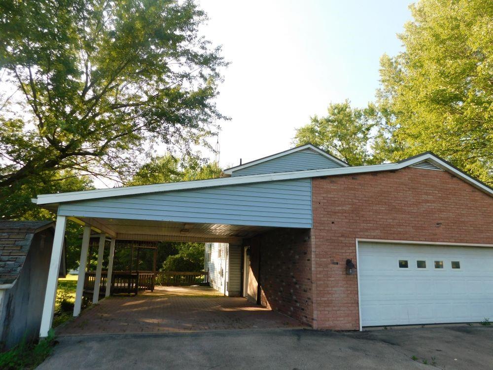 177 Fullingmill Road Mercer, PA 16137 - Photo 11 of 12 a front view of a house with garage