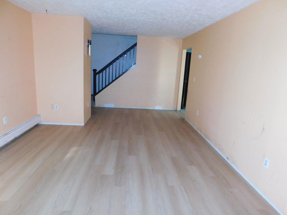 177 Fullingmill Road Mercer, PA 16137 - Photo 3 of 12 a view of an empty room with wooden floor