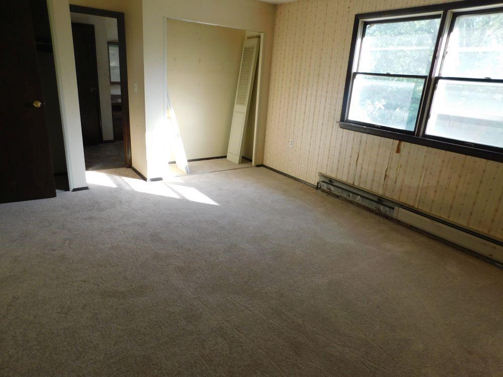 177 Fullingmill Road Mercer, PA 16137 - Photo 4 of 12 an empty room with windows