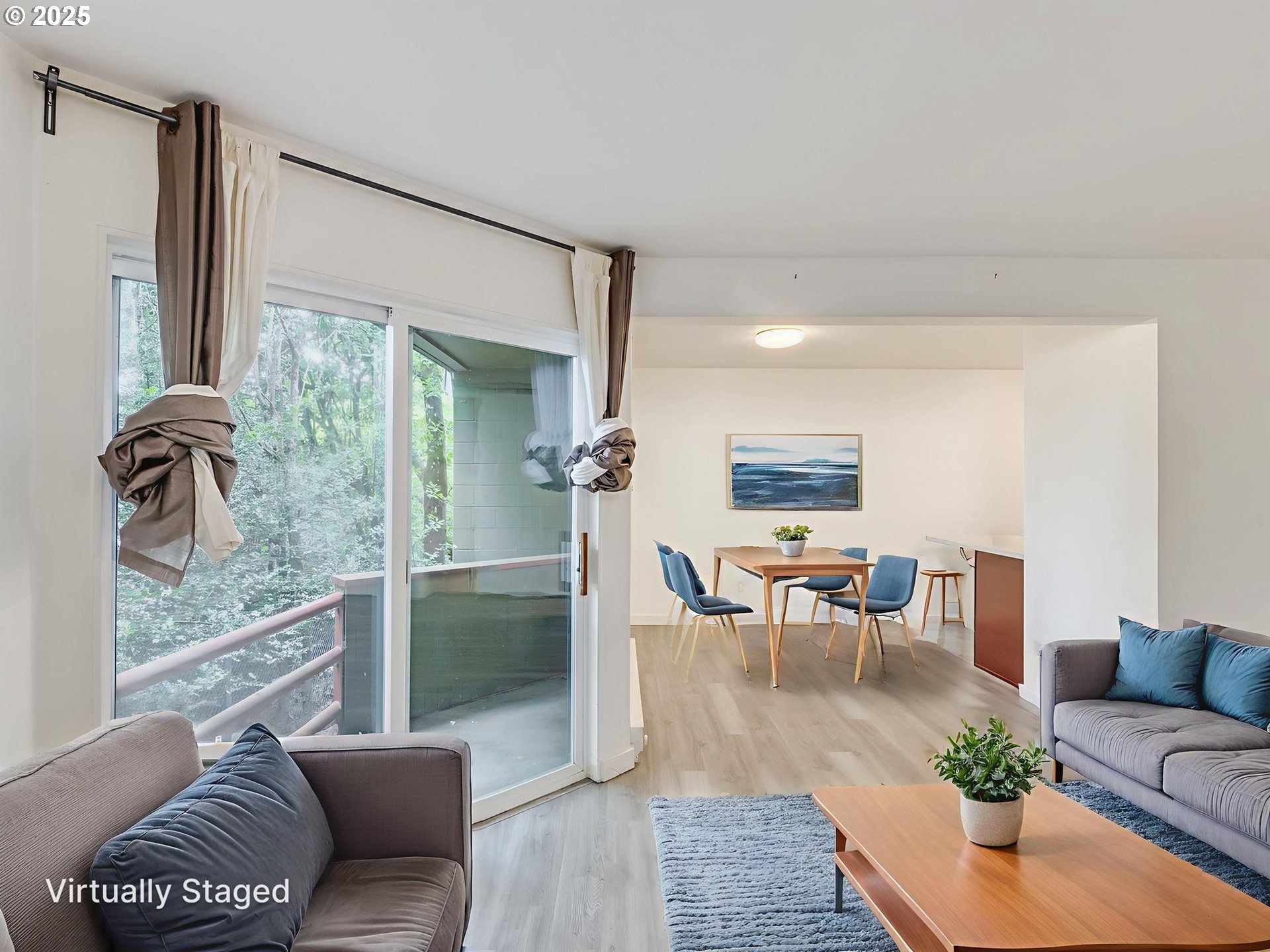 6220 Southwest Capitol Highway, Unit 7 Portland, OR 97239 - Photo 13 of 31 a living room with furniture and wooden floor