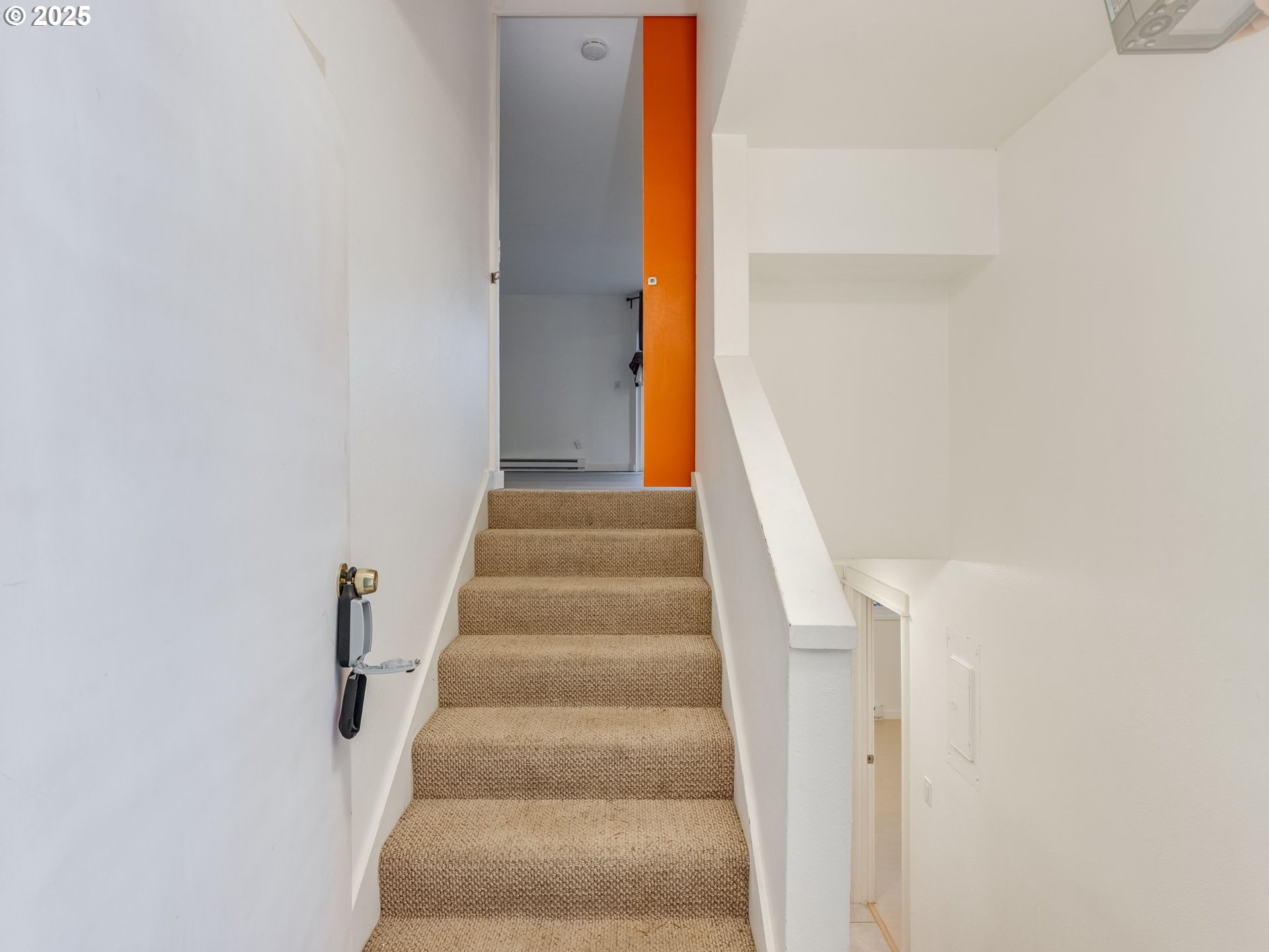 6220 Southwest Capitol Highway, Unit 7 Portland, OR 97239 - Photo 3 of 31 a view of staircase with white walls