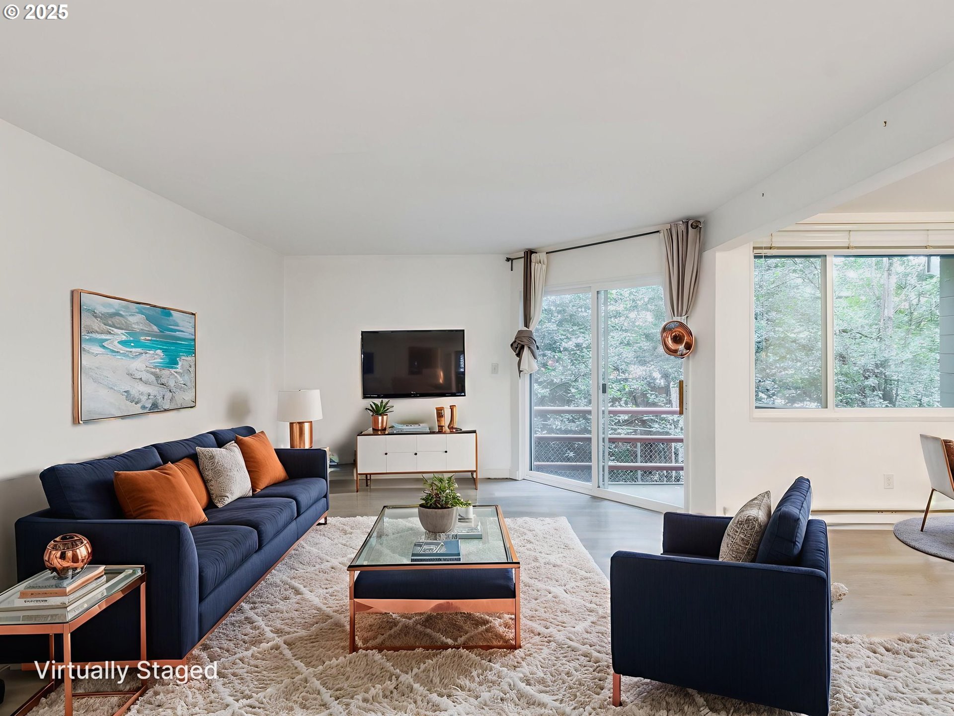 6220 Southwest Capitol Highway, Unit 7 Portland, OR 97239 - Photo 7 of 31 a living room with furniture and a flat screen tv