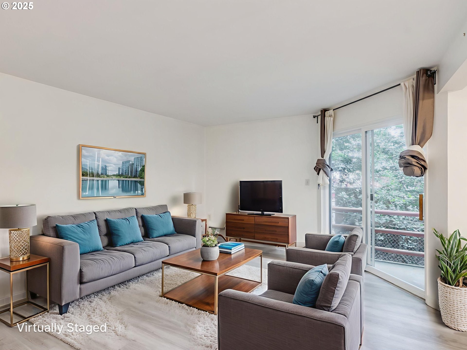 6220 Southwest Capitol Highway, Unit 7 Portland, OR 97239 - Photo 9 of 31 a living room with furniture a flat screen tv and a large window