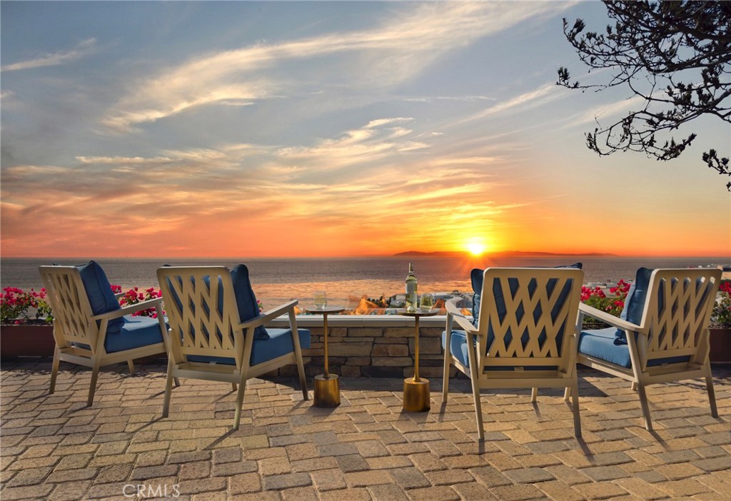 33971 Nauticus Isle Dana Point, CA 92629 - Photo 5 of 27 a view of a chairs and table on the terrace