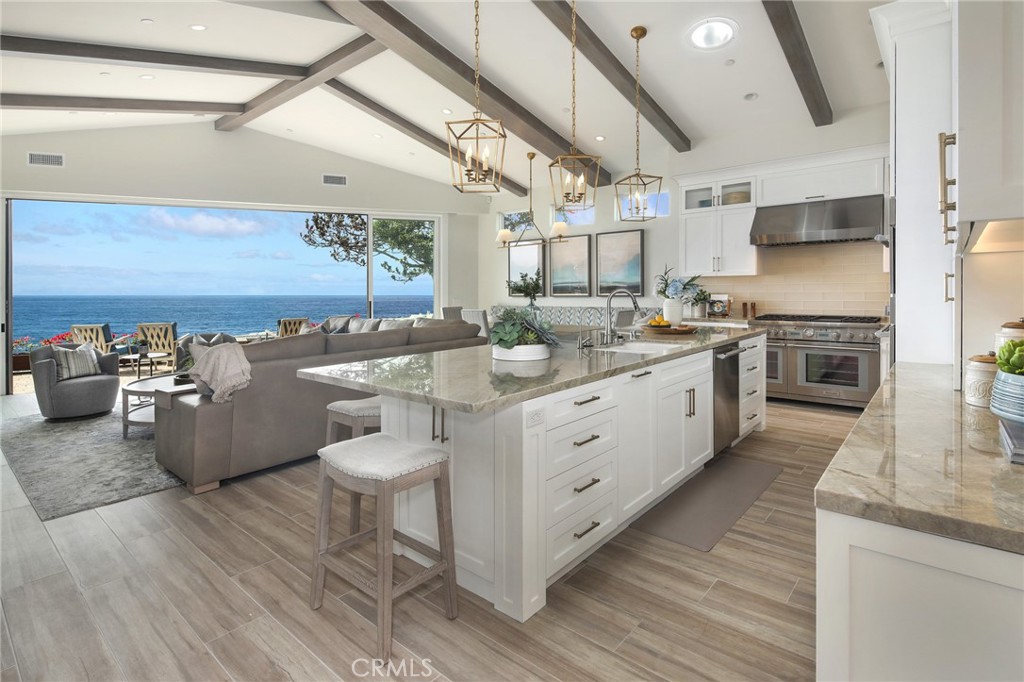 33971 Nauticus Isle Dana Point, CA 92629 - Photo 8 of 27 a kitchen with a sink appliances and cabinets