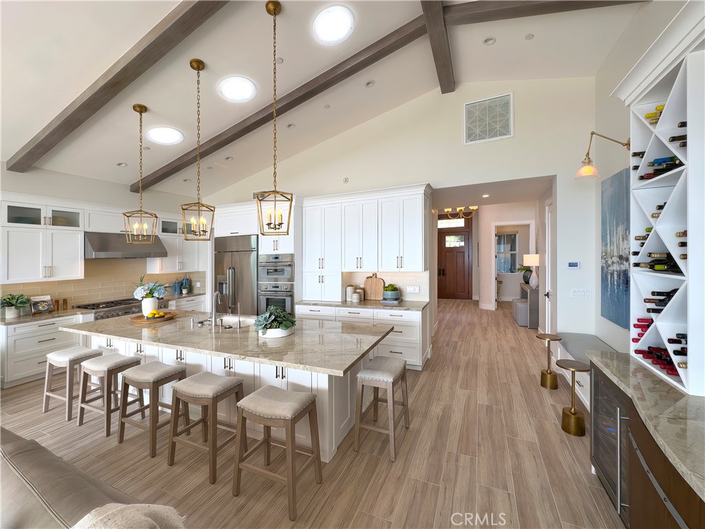33971 Nauticus Isle Dana Point, CA 92629 - Photo 9 of 27 a view of a dining area with furniture and wooden floor