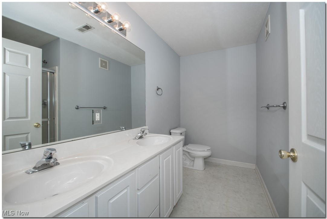 28360 Center Ridge Road, Unit 222 Westlake, OH 44145 - Photo 23 of 30 Full Bathroom with Dual Vanity