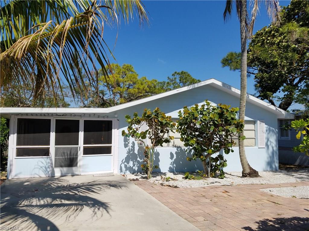 1009 Ridge Street Naples, FL 34103 - Photo 1 of 10 a view of a house with a patio