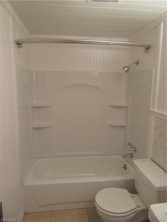 1009 Ridge Street Naples, FL 34103 - Photo 10 of 10 a bathroom with a shower and a toilet